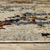 5' X 8' Beige Rust And Light Blue Abstract Distressed Area Rug With Fringe