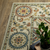 3' X 5' Ivory Blue And Burnt Orange Oriental Area Rug With Fringe