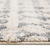 5' X 8' Gray And Ivory Geometric Shag Area Rug