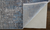 7' X 10' Blue and Gray Abstract Power Loom Distressed Area Rug With Fringe