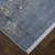7' X 10' Blue and Gray Abstract Power Loom Distressed Area Rug With Fringe