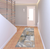 8' Beige And Black Floral Distressed Runner Rug