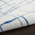 5' X 7' Ivory And Blue Geometric Distressed Area Rug