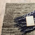2' X 8' Beige And Grey Abstract Power Loom Stain Resistant Runner Rug Polypropylene