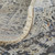 2' X 3' Ivory Gray And Taupe Abstract Power Loom Distressed Area Rug With Fringe