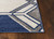 3' X 5' Blue Ivory And Gray Geometric Area Rug