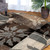 Homeroots Home Decor 8' Round Beige and Gray Floral Power Loom Distressed Stain Resistant Area Rug