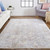9' X 13' Ivory Tan And Taupe Abstract Stain Resistant Area Rug