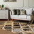 5' X 8' Black And Ivory Quatrefoil Distressed Area Rug