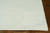 8' Ivory Polyester Rug