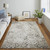 5' X 8' Ivory And Gray Abstract Power Loom Distressed Area Rug
