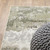 6' X 9' Beige Grey Brown And Sage Green Abstract Power Loom Stain Resistant Area Rug