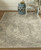 5' X 8' Ivory Gray And Black Abstract Stain Resistant Area Rug