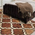 4' X 6' Brown And Ivory Quatrefoil Distressed Area Rug
