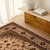 5' X 8' Beige and Black Floral Medallion Power Loom Area Rug