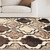 4' X 6' Ivory Brown And Black Quatrefoil Distressed Area Rug