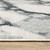 10' X 13' Blue Black And Ivory Abstract Area Rug With Fringe