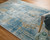 13' X 20' Blue Gold and Gray Abstract Power Loom Area Rug With Fringe
