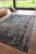 9' X 13' Black And Gold Chevron Washable Area Rug