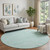 8' Teal And Ivory Abstract Washable Round Rug With UV Protection