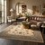 10' X 13' Cream And Blue Abstract Area Rug