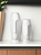Set of Two Ceramic White Cylinder Table Vases