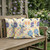 Set of Three Off White And Orange Peacock Indoor Outdoor Throw Pillow
