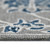 5' X 8' Gray Blue And Ivory Wool Floral Hand Hooked Area Rug
