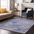 9' X 12' Blue And Ivory Abstract Washable Area Rug With UV Protection