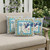Set of Three Light Green Beige And Pink Peacock Indoor Outdoor Throw Pillow