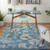 5' X 7' Turquoise Cream and Navy Blue Floral Distressed Area Rug