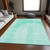 8' X 10' Teal And Ivory Geometric Washable Area Rug With UV Protection