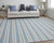 8' X 11' Ivory And Blue Striped Handmade Indoor Outdoor Area Rug