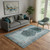 5' X 8' Teal And Ivory Geometric Washable Area Rug With UV Protection