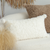 Ivory Sherpa Lumbar Pillow with Tassel Details