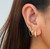 NADINE GOLD PAVE HUGGIE HOOP EARRINGS