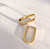 CLEO GOLD OVAL HOOP EARRINGS