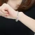 Collette Z Sterling Silver with Rhodium Plated Clear Oval with Round Cubic Zirconia Halo Bracelet
