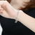 Collette Z Sterling Silver with Rhodium Plated Clear Round Cubic Zirconia Rectangular Link Bracelet