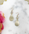 Genuine Crystal & Brushed Gold Teardrop Pendant Earrings 