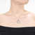 Collette Z Sterling Silver with Rhodium Plated Clear Round Cubic Zirconia Heart and Triangle Pendant Necklace