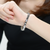 Collette Z Sterling Silver with Rhodium Plated Clear Round Cubic Zirconia Bezel Bracelet