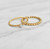 NAOMI GOLD TWIST SOLITAIRE RING