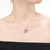Collette Z Sterling Silver with Rhodium Plated Champagne Trillion with Clear Round Cubic Zirconia Swirl Drop Necklace