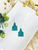 Genuine Glitter on Leather Cow Tag Earrings 