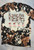 This Mama Loves Her Herd Cowhide Name Bleached Tee