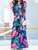 SURPLICE NECK BELTED FLORAL MAXI DRESS