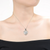 Collette Z Sterling Silver with Rhodium Plated Clear Trillion with Round Cubic Zirconia Pendant Necklace