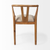 Beige And Brown Upholstered Fabric Wishbone Back