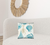 17" X 17" Teal Khaki And Ivory Seashells Zippered Polyester Coastal Throw Pillow Cover